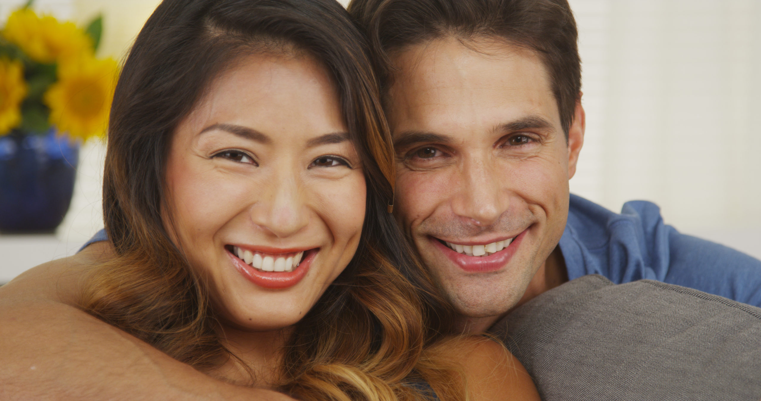 Happy mixed race couple smiling